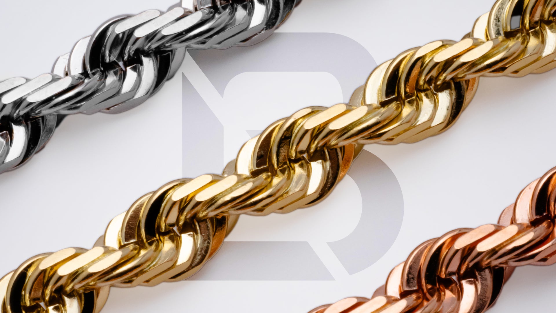 Solid gold rope chains layered over display