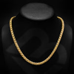 14 karat gold necklace over a black neck display