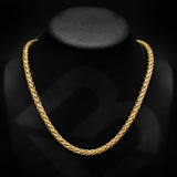 14 karat gold necklace over a black neck display